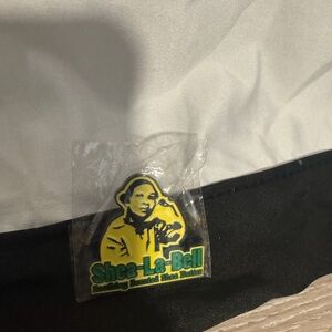 Shea-La-Bell Pin with Yellow and Green Design